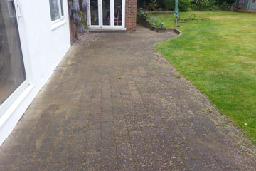 Before Pressure Tech cleaned the patio blockpaving in Chipstead